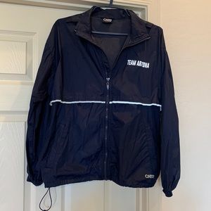 Navy blue hooded windbreaker full zip with zipper pockets.